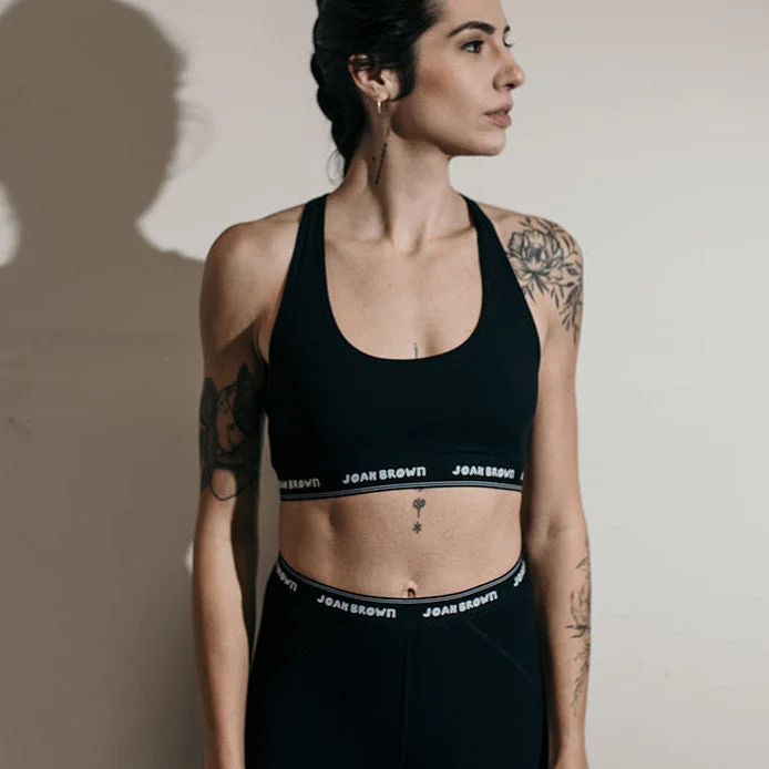 Bra with a cross - back strap design for a trendy look​ The Sports Bra