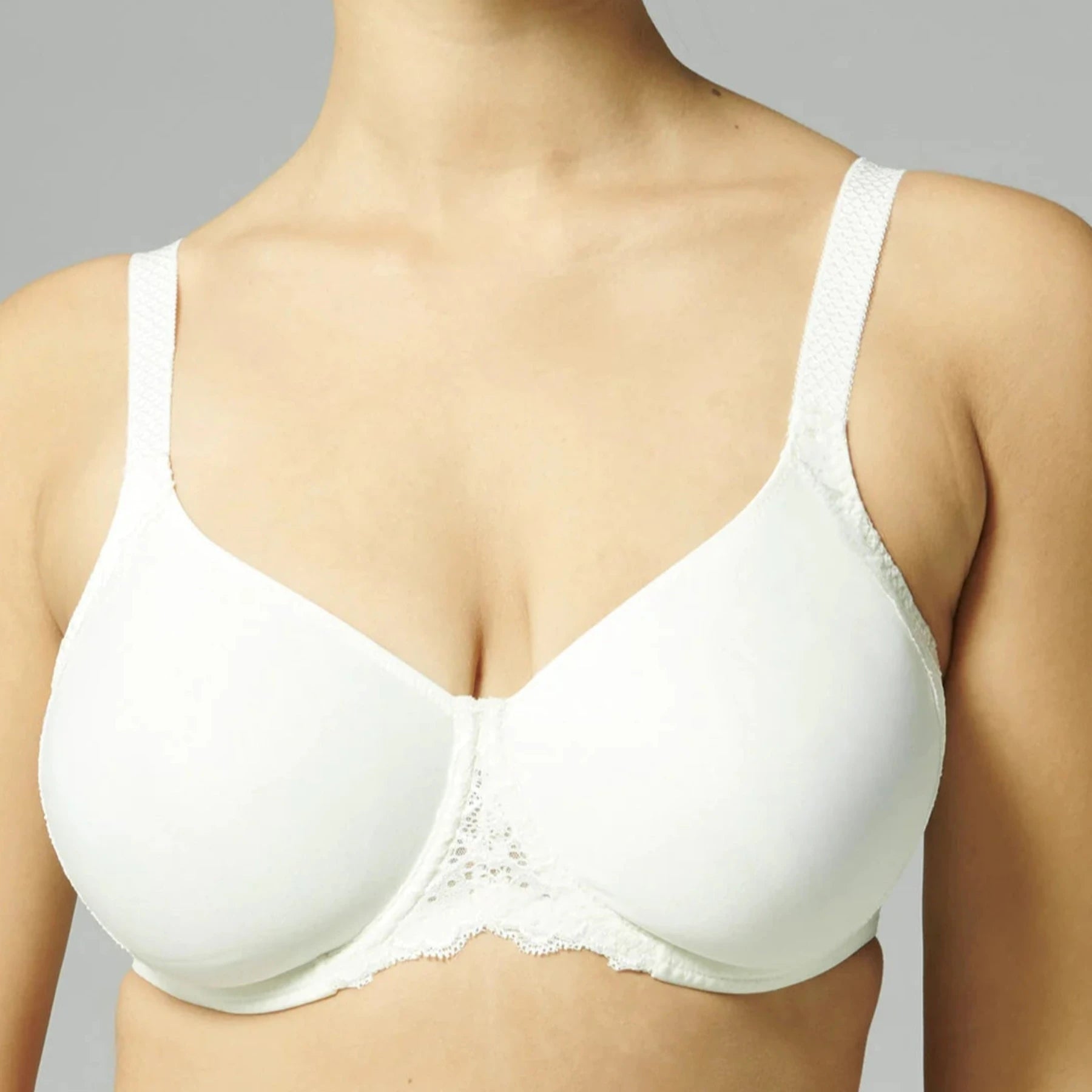 Convertible bras with adjustable straps for versatile styling​ Caresse Minimizer Bra 12A380 - Ivory